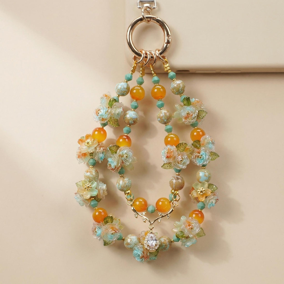Handmade Floral Beaded Phone Charm | Orange & Turquoise Oriental Strap